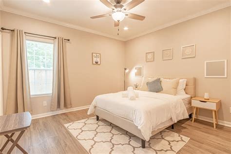 Luxury 1-3 bedroom apartments featuring granite countertops, stainless steel appliances, and faux-wood floors. . Airbnb conroe texas